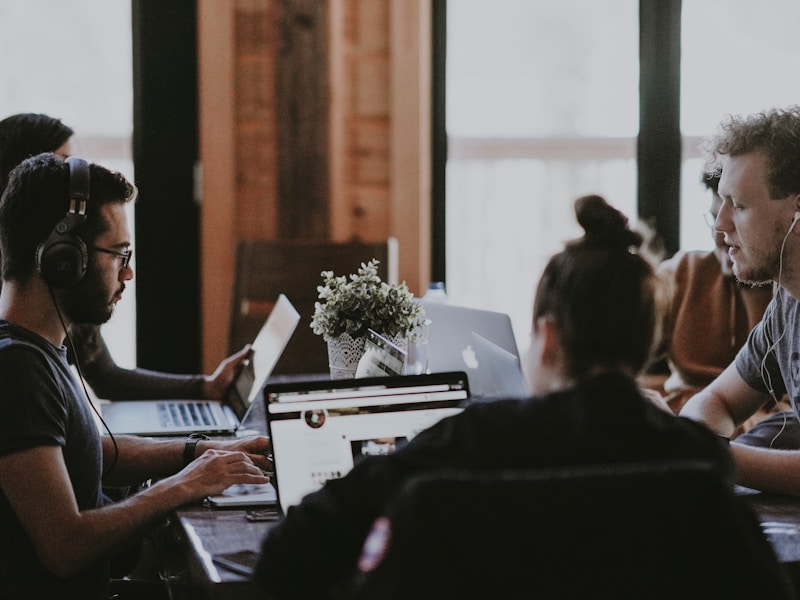 Fair Consideration Framework Singapore Employer reviewing job applications in Singapore office