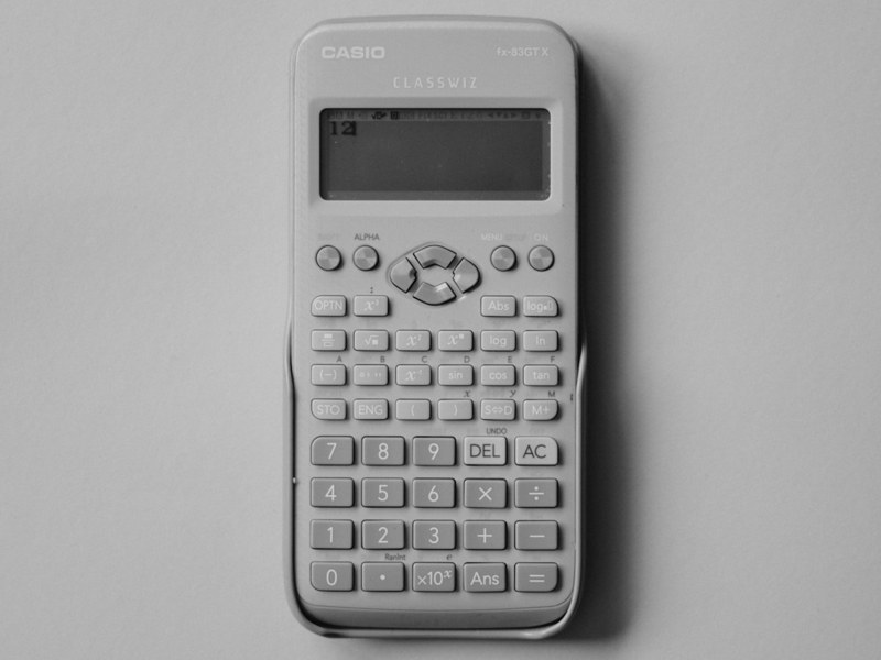 White calculator on a desk
