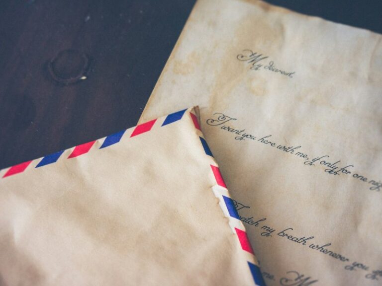 Envelope on top of a letter, representing a letter of demand sent to a company director