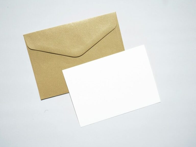 Blank sheet of white paper on a brown envelope, representing company letterhead and business stationery