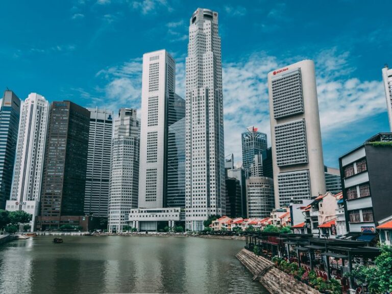 Shophouses along the Singapore River with the office towers of the Central Business District behind