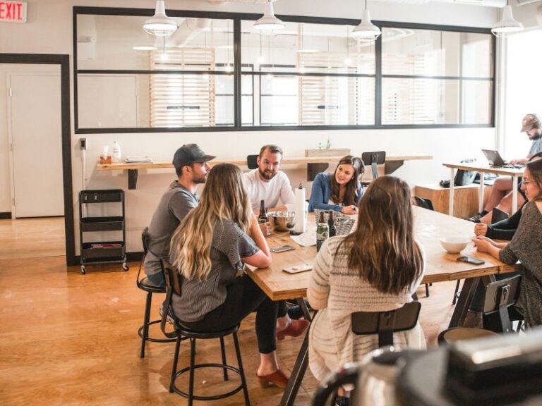 Manager and employee in a serious discussion at a meeting table