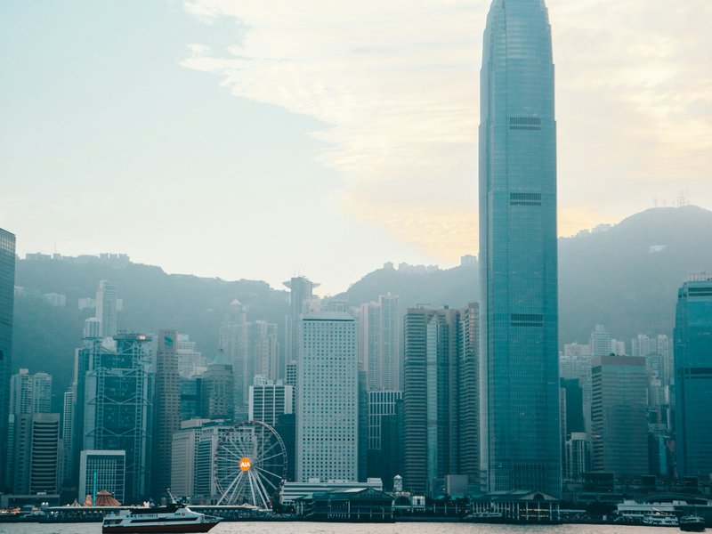 Hong Kong Central skyline and Victoria Harbour seen from across the water in daytime